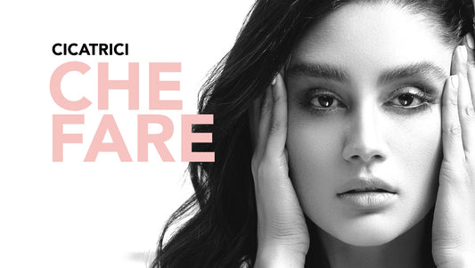 Donna con viso in primo piano e testo “Cicatrici che fare”, guida Terraluna sui segni della pelle e sulle cicatrici post acne